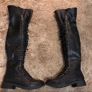 Thigh high combat boots